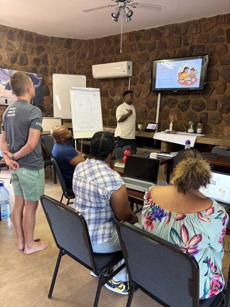A ministry team working together in a coaching session